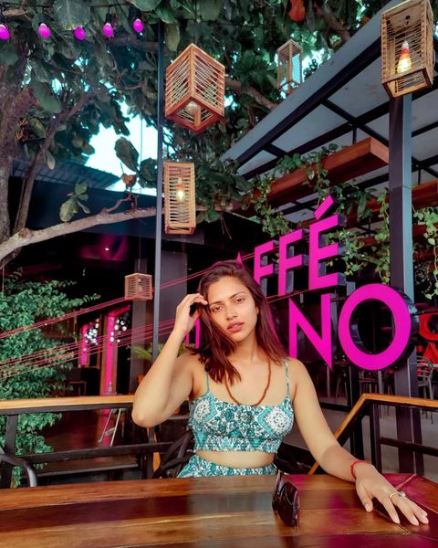 Amala paul hot photos posing in coffee shop near beach