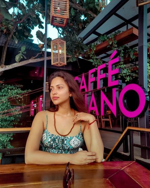 Amala paul hot photos posing in coffee shop near beach