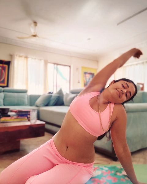 Poonam bajwa performing yoga poses in hot pink inner and tight pant