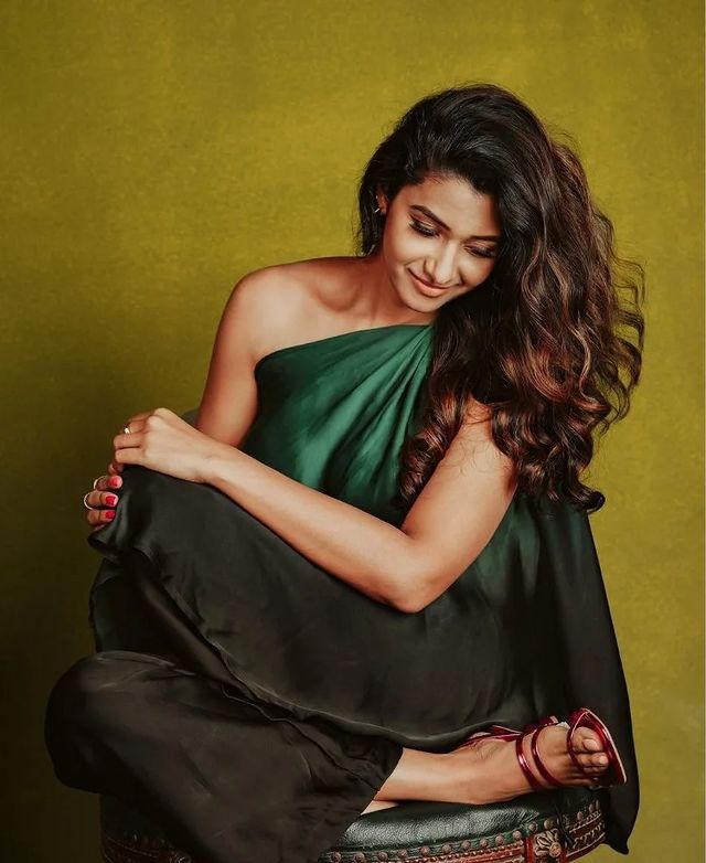 Priya bhavani shankar hot green velvet dress posing in smoke