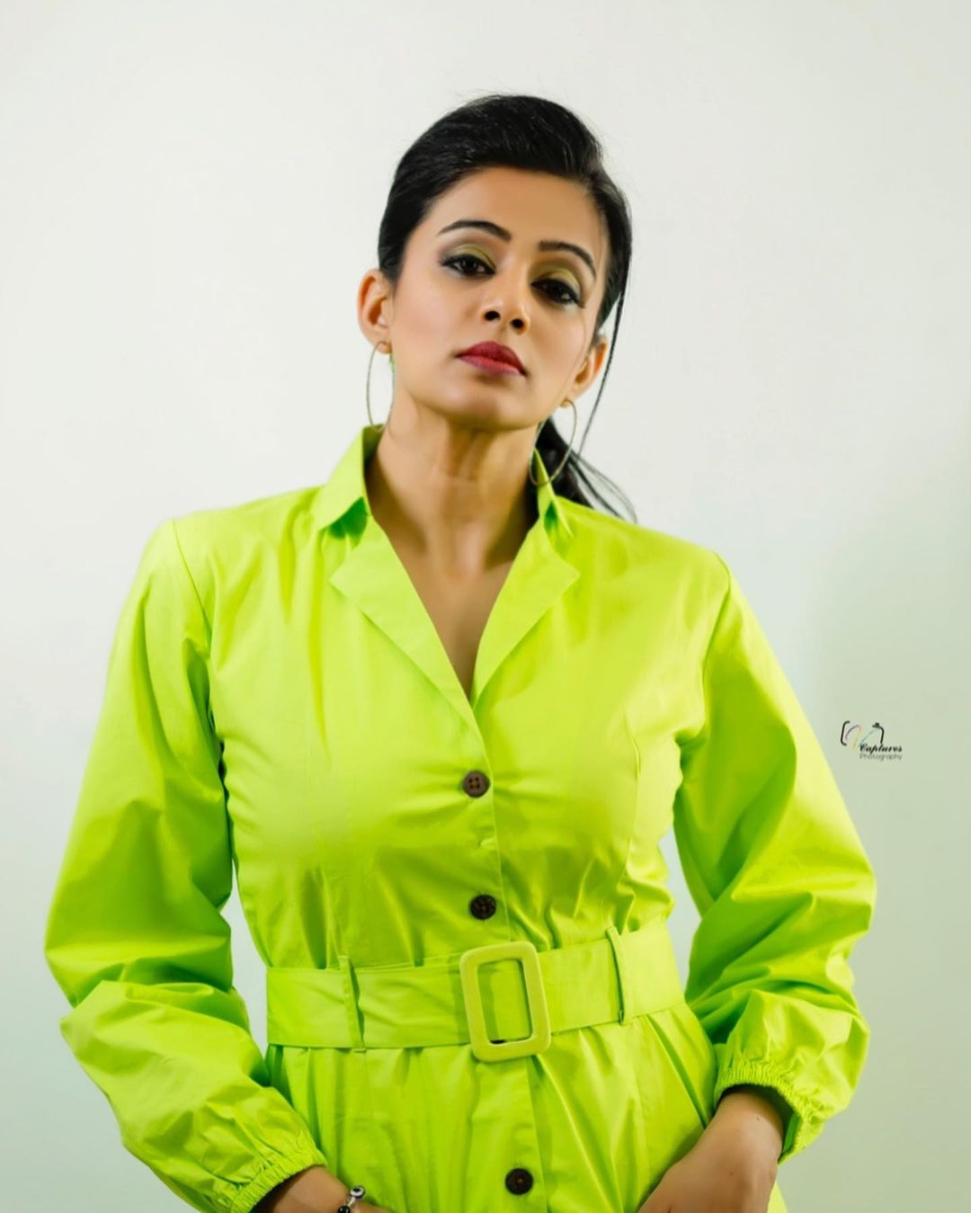 Priyamani hot single shirt green photos trending on internet