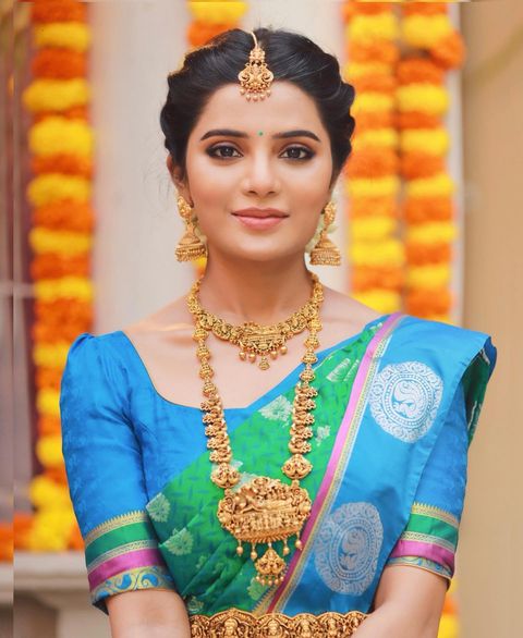 Aathmika hot latest look in bridal make up and modern dress