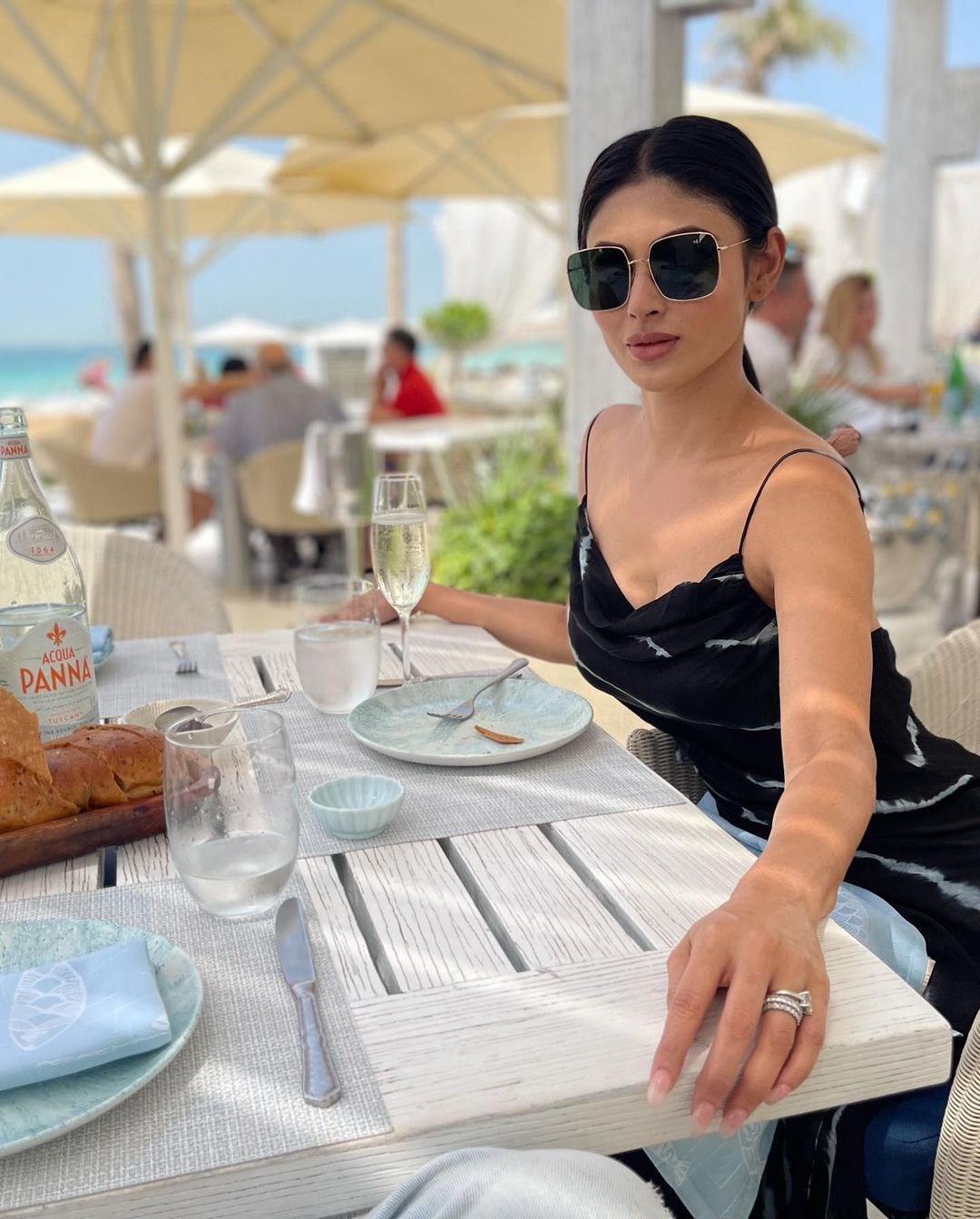 Mouni roy hot low neck fit tight dress photos on her vacation