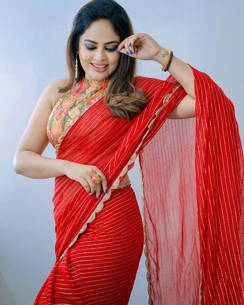 Nandita swetha hot red saree stills posted on social media