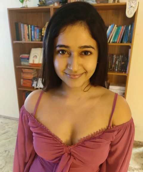 Poonam bajwa hot show in short gown low neck frock showing top angle