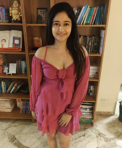 Poonam bajwa hot show in short gown low neck frock showing top angle