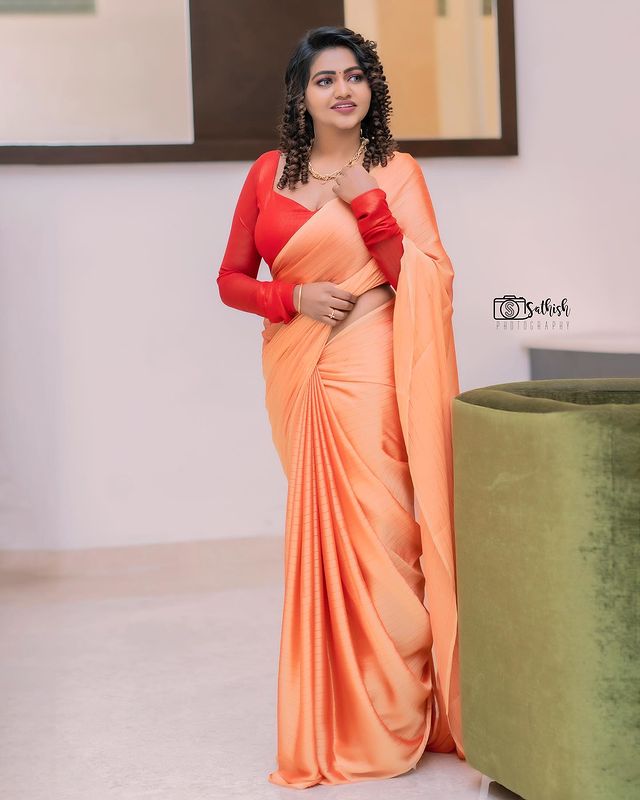 Shalu shammu hot photos and video in orange colour saree low neck blouse