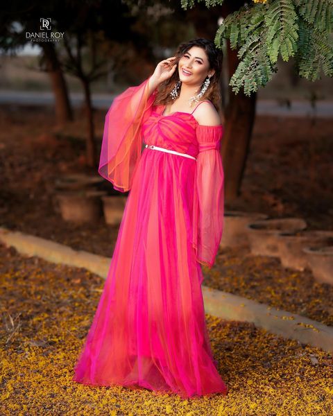 Sunita gogoi hot photos in red pink hot gown photos getting trending