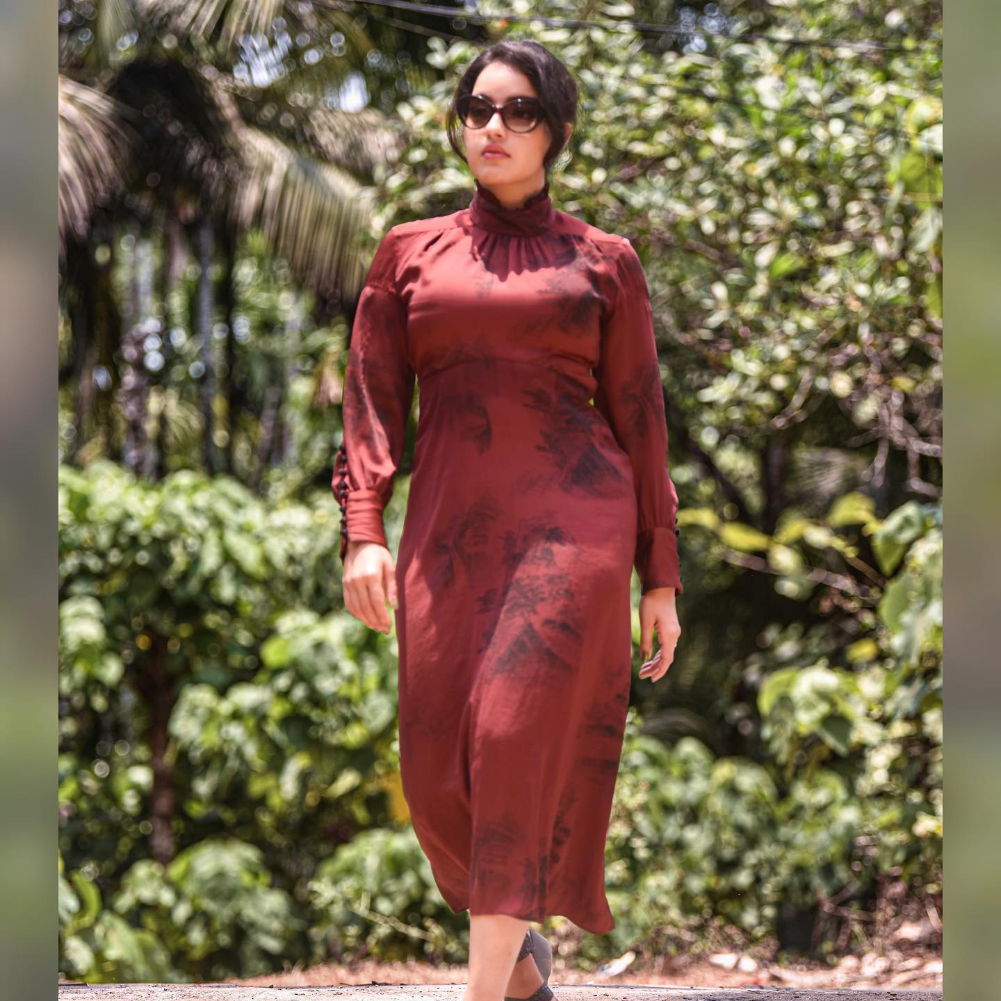 Malavika menon hot shape fit modern red dress stills