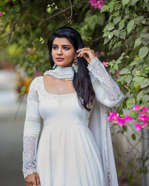Aiswarya rajesh hot low neck white chudithar dress stills posted on social media