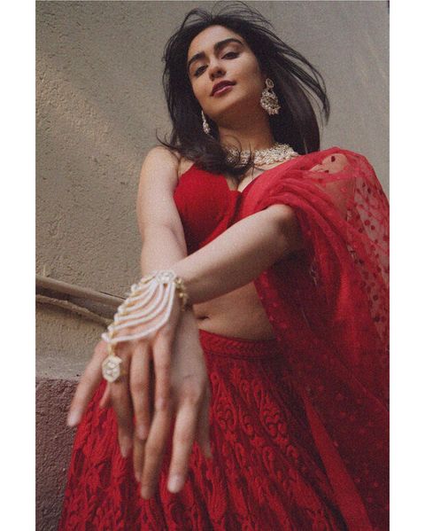 Adah sharma hot posing in red colour grand lehenga