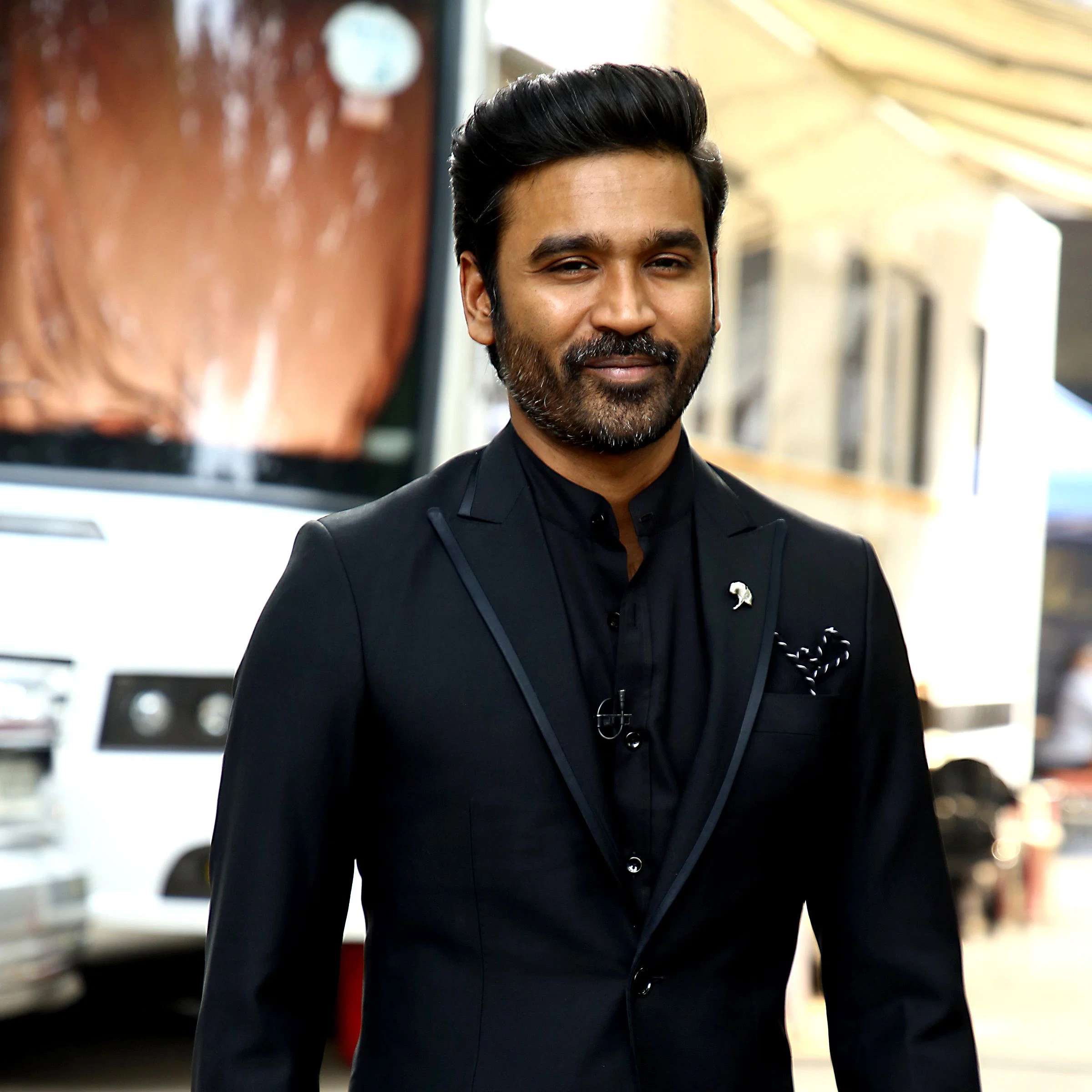 Dhanush playing cricket with his sons photos getting viral