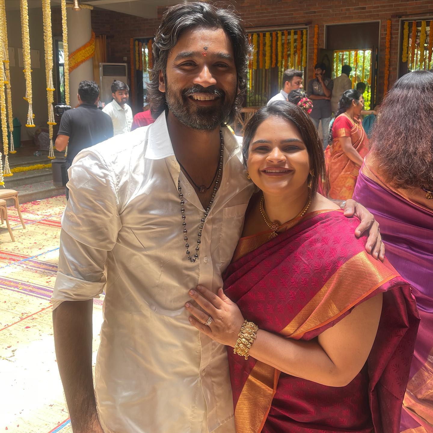 Dhanush and selvaragavan with actress vidhyulekha in family function