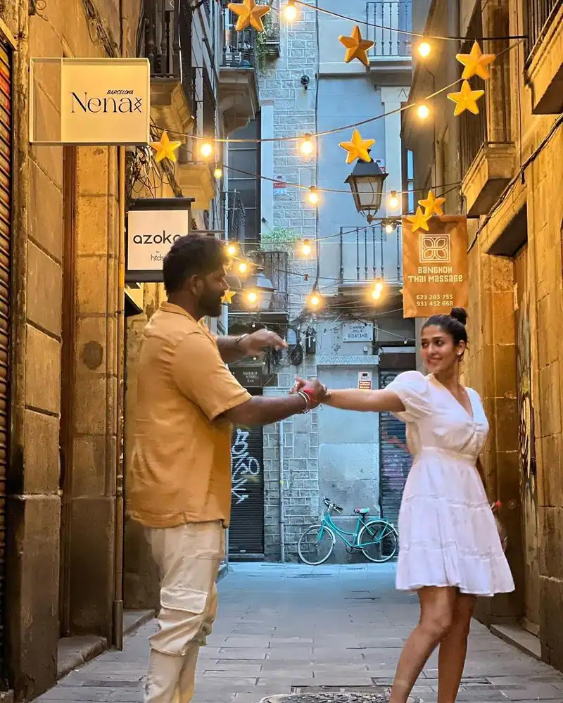 nayanthara vignesh shivan kiss photo from barcelona getting viral on social media