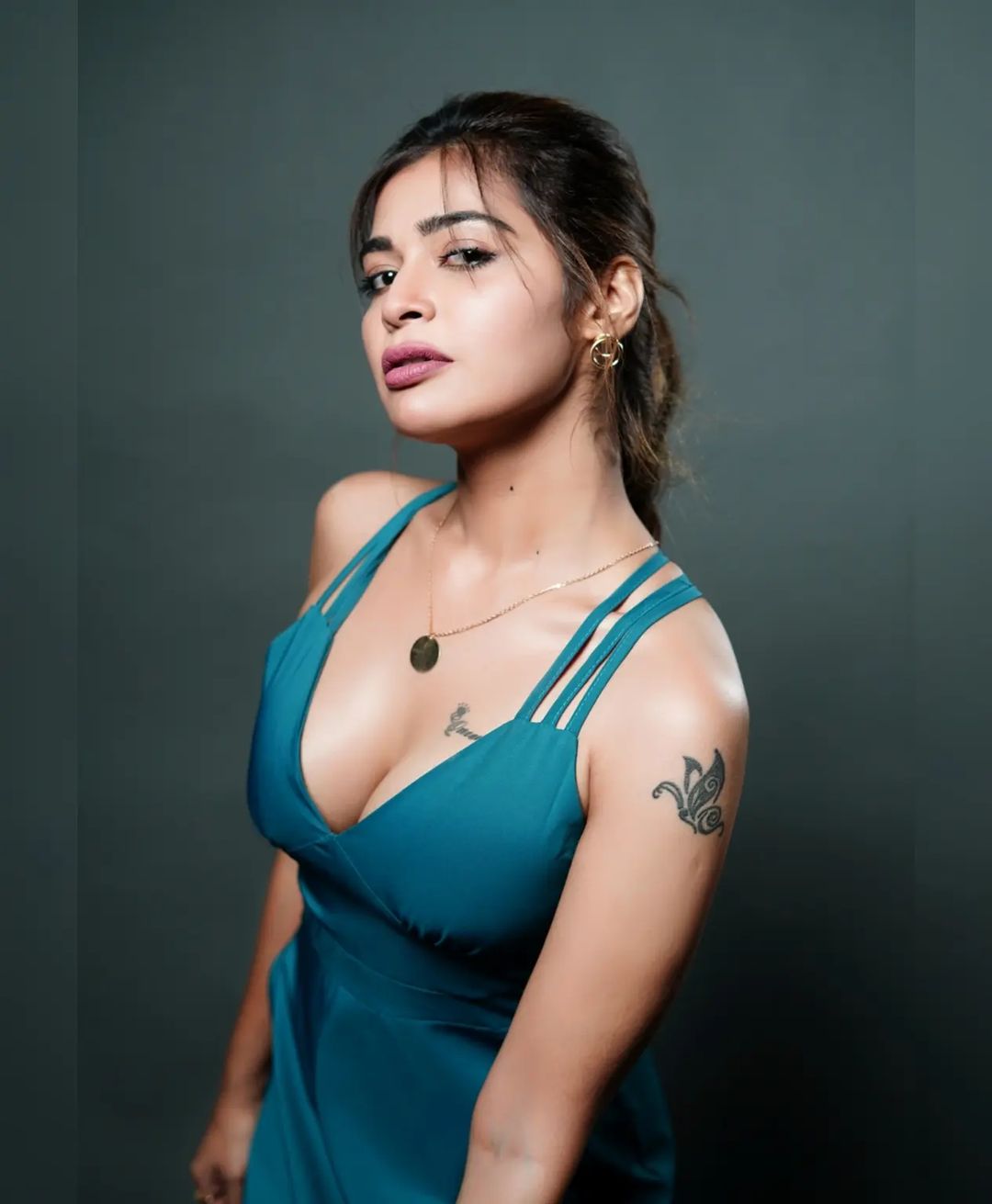dharsha gupta hot photos in low neck glamour dress getting viral