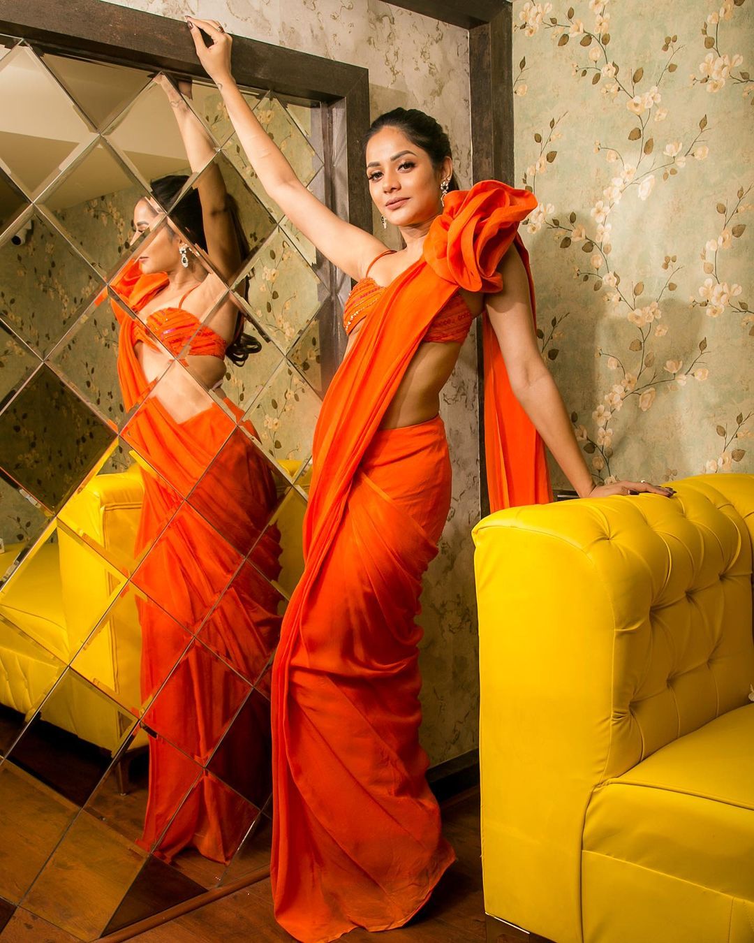 aiswarya dutta hot photos in orange colour dress getting viral