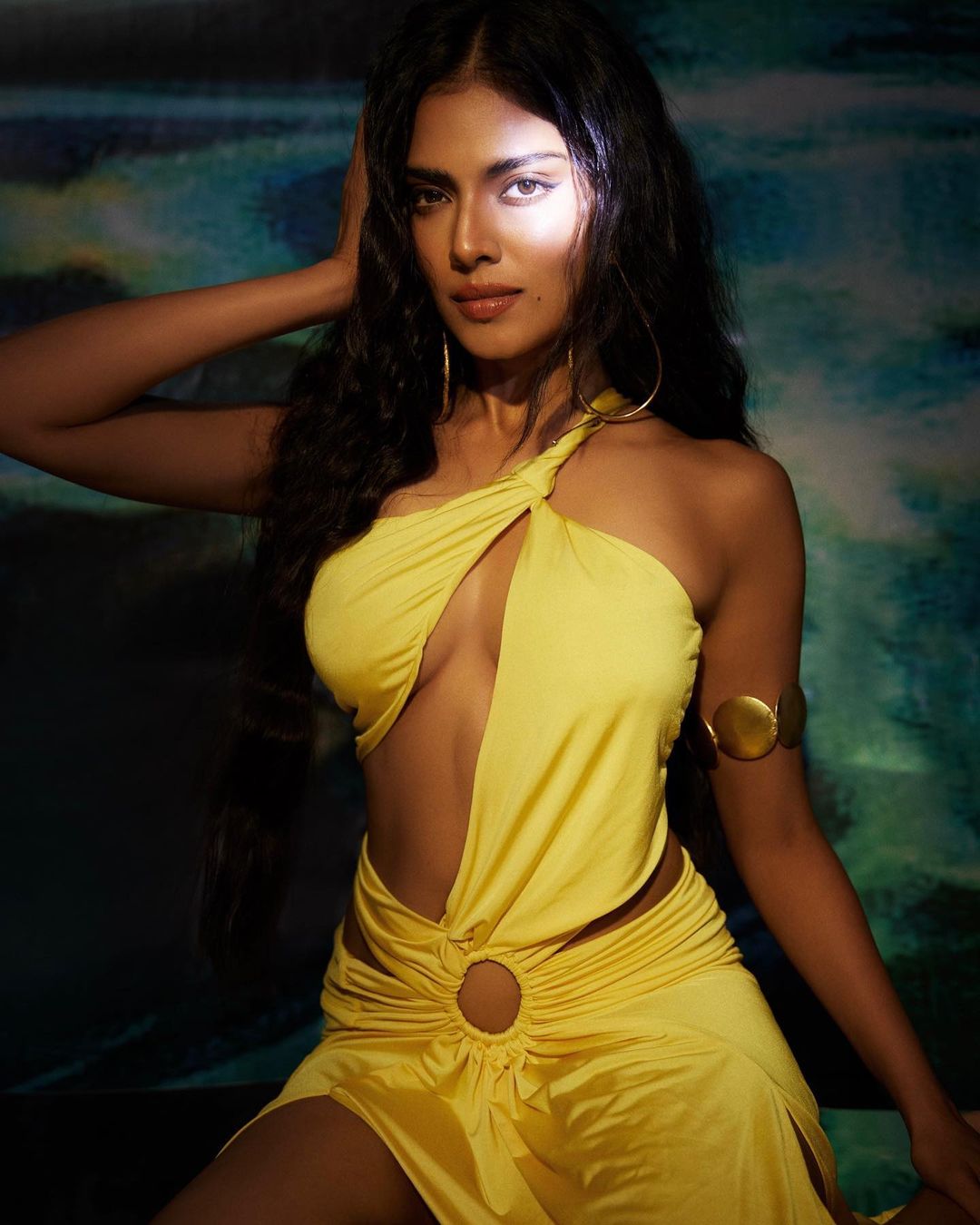 malavika mohanan hot photos in glamour yellow dress getting viral on social media